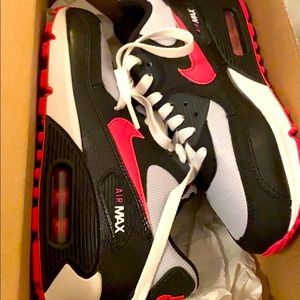 Pink, black, and white Nike Air Max 90s